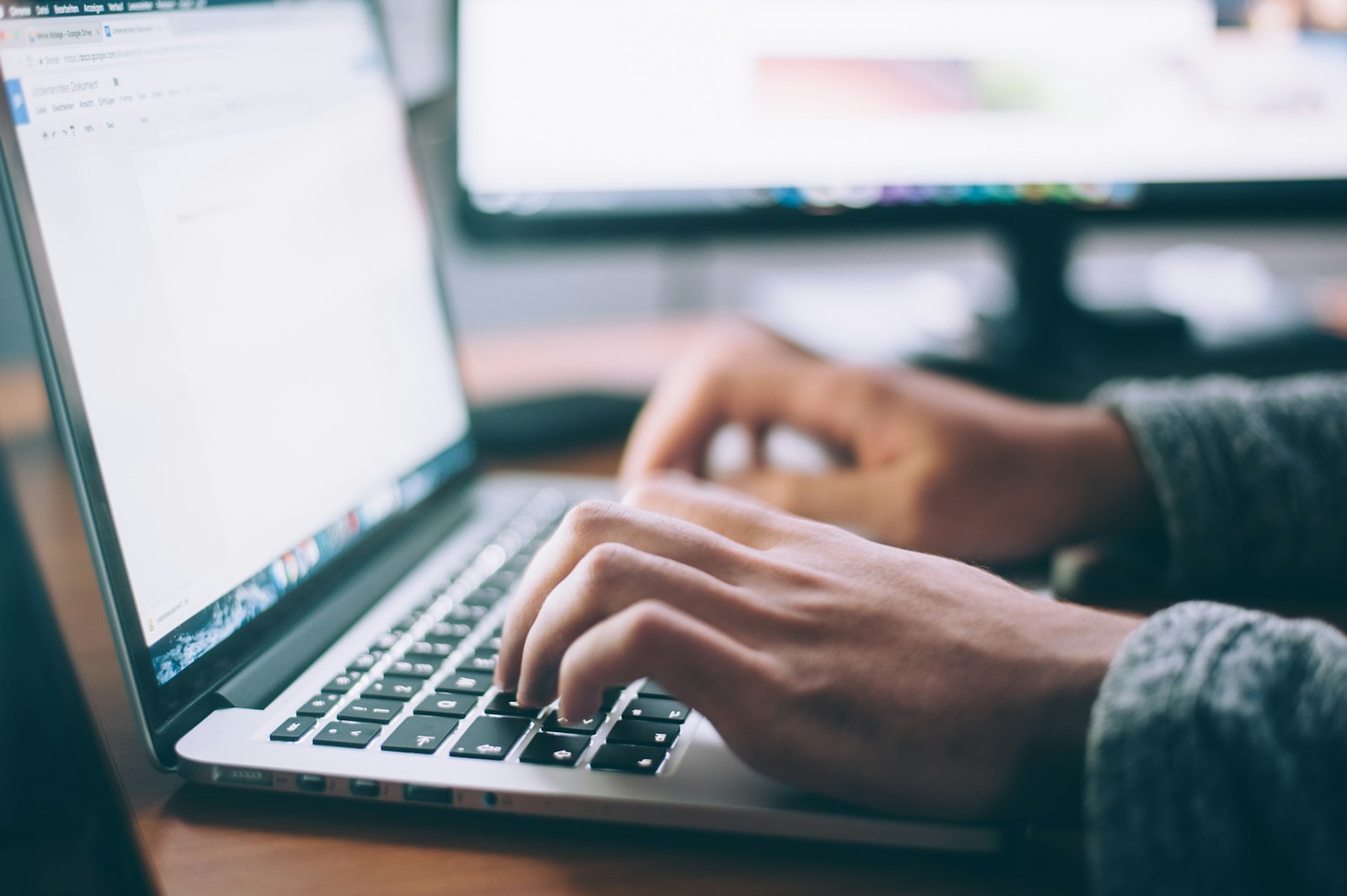 Employee reviewing suspicious email at office desk