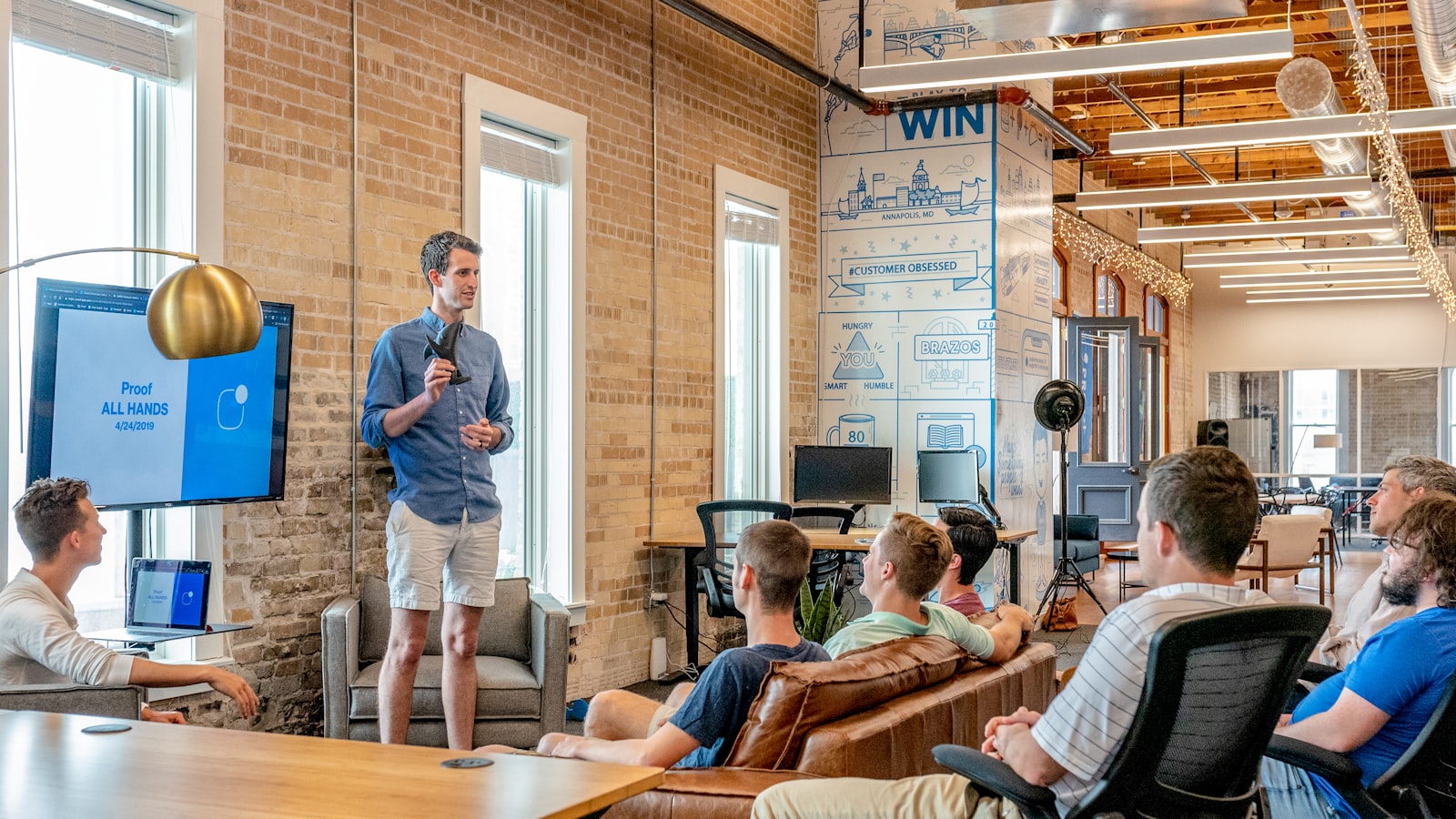 Cross-functional team running a tabletop exercise around a conference table